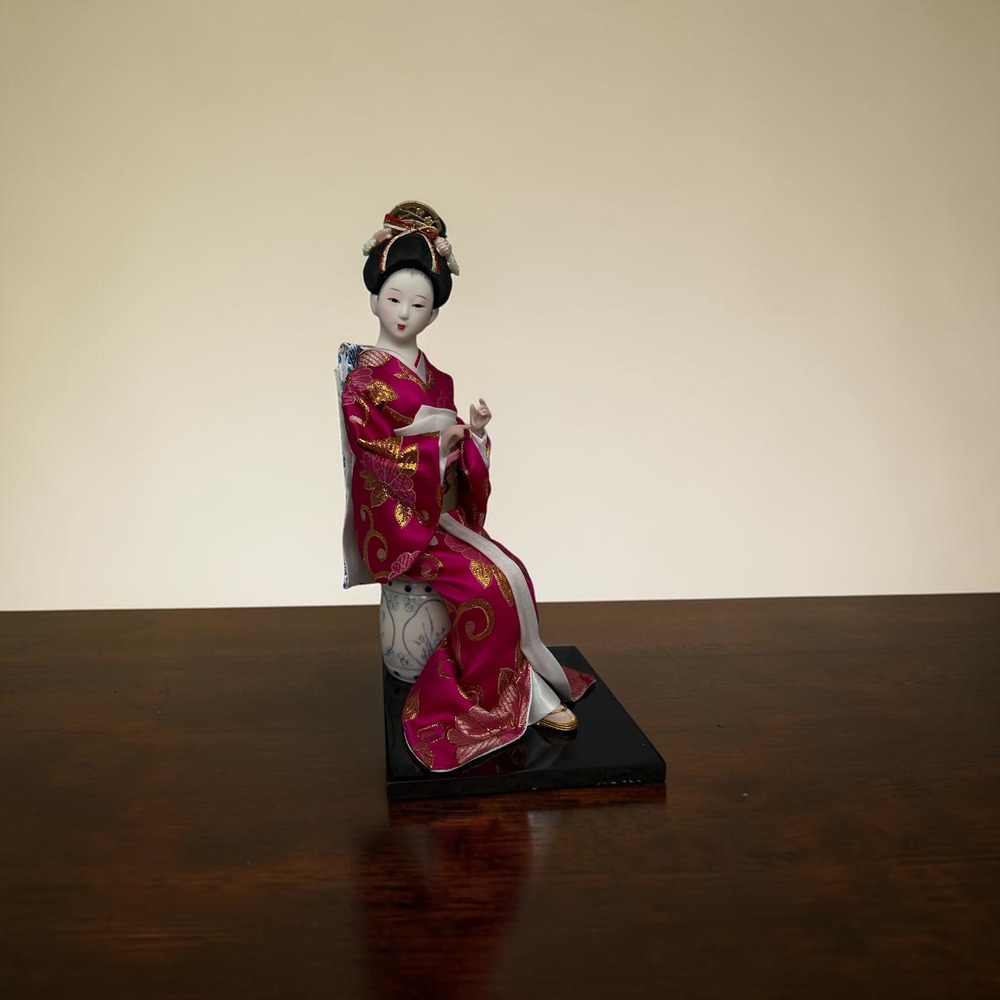 Vintage Japanese Geisha Doll Seated on Ceramic Stool Magenta Silk Kimono 12.5"